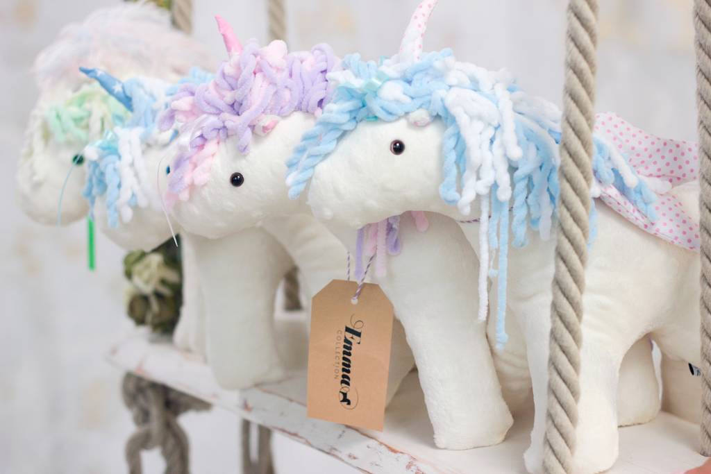Why have plush toys been popular for centuries?